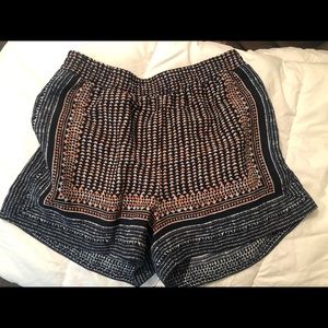 BCBG pattern shorts with pockets non shear fabric